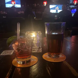 Vodka and cranberry. Draft beer.