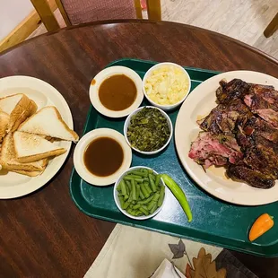 ows a tray of food on a table