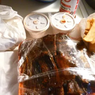 Slab w fries to go. Love the steak fries. Get the hot bbq sauce on side. Really tasty.