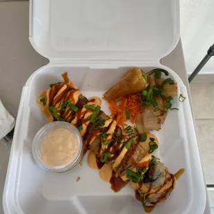 a styrofoam container of food