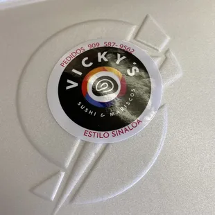 a sticker on a laptop