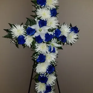 Blue Rose cross funeral arrangement