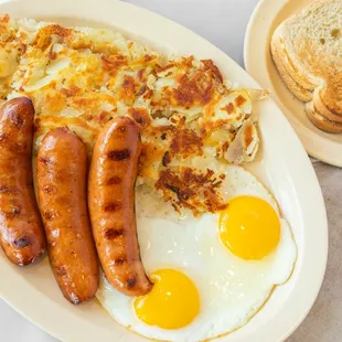 Indulge in our Sausage and Eggs Breakfast Platter, crafted to satisfy your morning cravings.