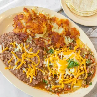 Experience the authentic flavors of Mexico with our Huevos Rancheros. This breakfast masterpiece is a perfect balance of flavors and texture