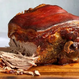 a pork roast on a cutting board