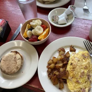 Ham and cheese omelette w mushrooms, side of fresh fruit and English muffin