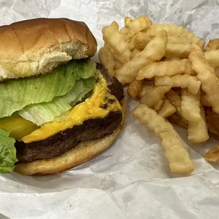 Homemade cheeseburger and crinkle fries