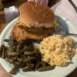 Two pieces of nice fish with green beans and macaroni and cheese