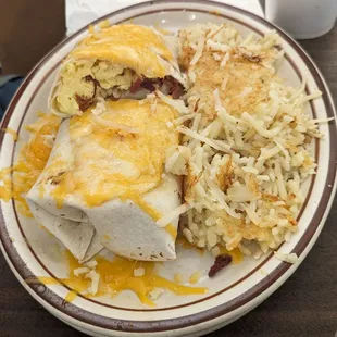 Bacon breakfast burrito for my kid w enough leftovers to last him til he graduates! Delicious!