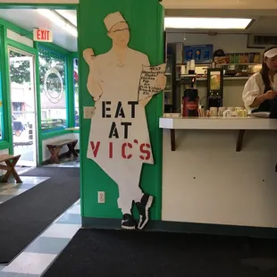 a man sitting at a counter
