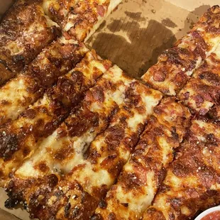 Bacon bread sticks.