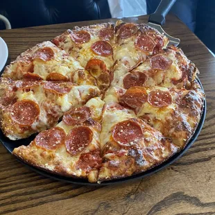 Pepperoni and PEPPERONI CREAM CHEESE pizza.