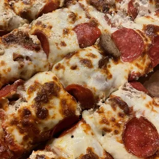 Stamp Collector. Sausage, pepperoni and garlic cream cheese.