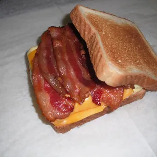 Bacon, egg, and cheese sandwich on white toast