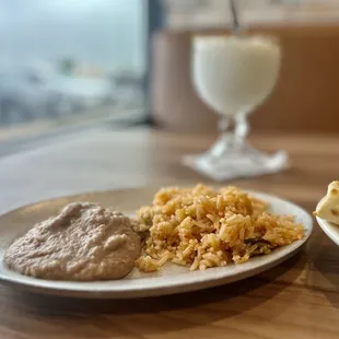 a plate of food and a glass of milk