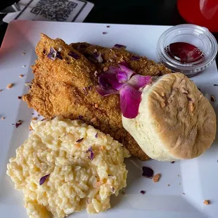 Cheese grits and fish. Omg!! Fish is the bomb!! Some of the best I've ever had.