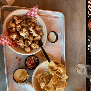 Roasted cauliflower and chips with salsa. I asked for beer cheese sauce too!