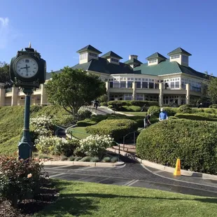 a clock in front of a building