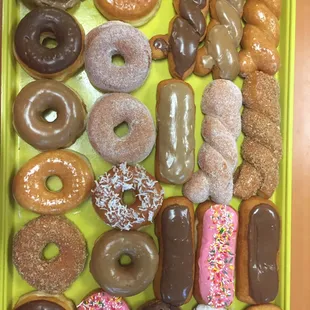 a tray of assorted donuts