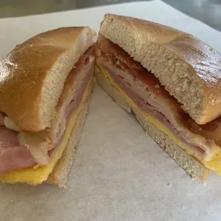 Bagel egg, ham, bacon, cheese and turkey.