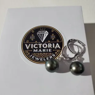 Tahitian black pearls with diamond accents.