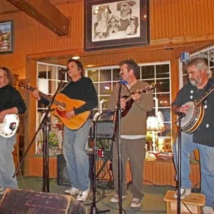 a group of men playing musical instruments