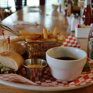 a plate of food and a cup of coffee