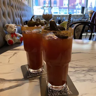 two cocktails on a table