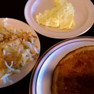 Pancake, scrambled egg and hash browns