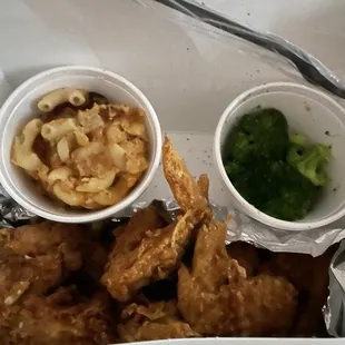 This is what they gave me for $17. Wings the size of wing dings with feathers, scraped mac &amp; cheese, &amp; three broccoli florets.