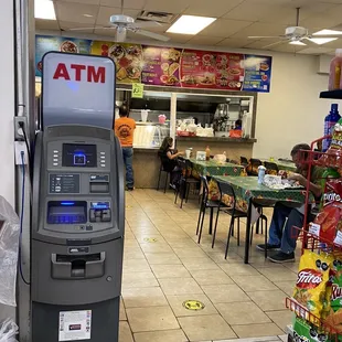a cash machine in a grocery store