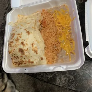 Grilled chicken quesadilla with rice and beans