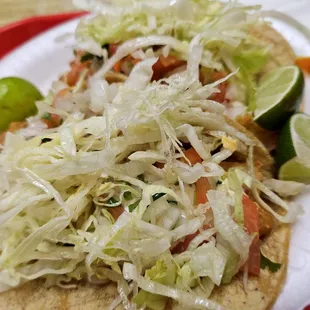 a taco on a paper plate