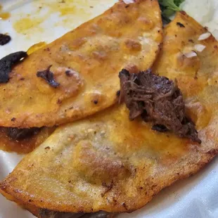 Quesabirria tacos - very filling, super tasty (there was 3 total)