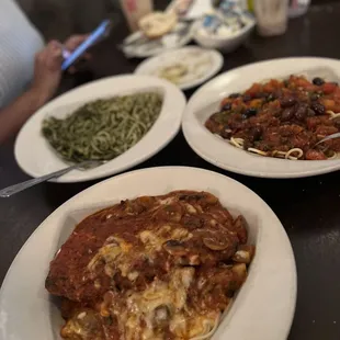 three plates of pasta and vegetables