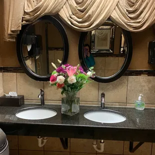 Bouquet of flowers. Fresh flowers in restroom.