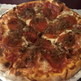 Mini pizza. Sausage and pepperoni.