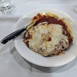 a plate of pasta and sauce