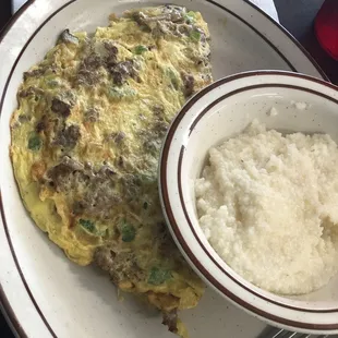 Philly steak omelette w/grits.