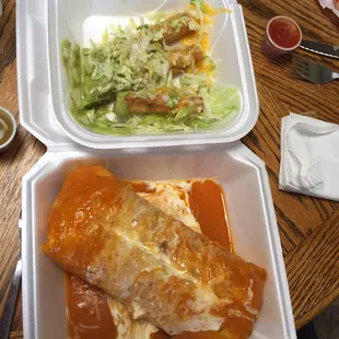 One of the burritos and some tacitos