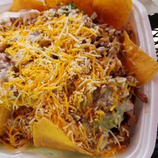 Super Nachos is enough for 2-3 people when you add meat.