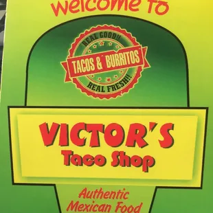a sign for victor's taco shop