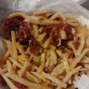 Fries are barely cooked. Flavorless, no seasoning,no queso. Just disgusting waste of money