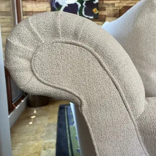 Not round as it was and didn't match either side or other two sofas. And dirt spots.