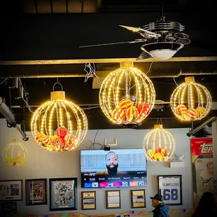 a man watching television in a restaurant