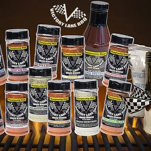 a pile of bottles and a shaker