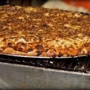 a large pizza on a pan