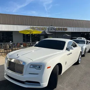 the front of a white rolls royce