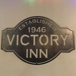 the sign for victory inn