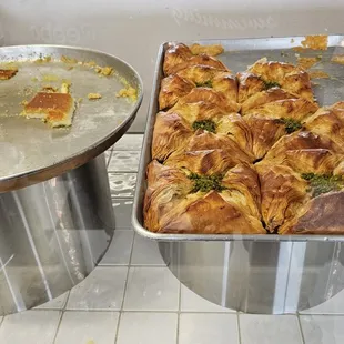 a tray of pastries and a pan of pastries